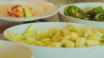 Bowls of vegetables are arranged on a table video