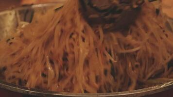 A bowl of noodles with a fork video