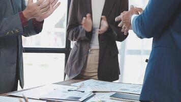 Business people clapping at a meeting video