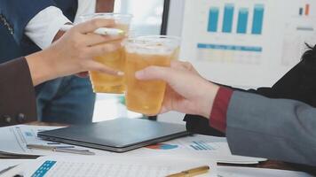 Business people toasting with beer video