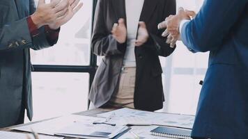 Business people clapping at a meeting video