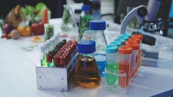 A laboratory table with various chemicals and test tubes video