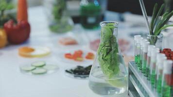 A table with a glass vase filled with water and vegetables video