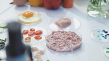 A table with various ingredients including meat, vegetables and eggs video