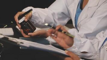 Two doctors are working on a project together video