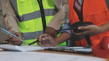 Two construction workers working on a project video