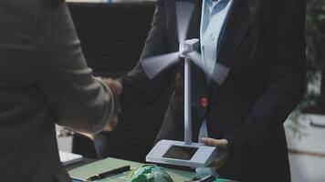 Businessman shaking hands with another person video