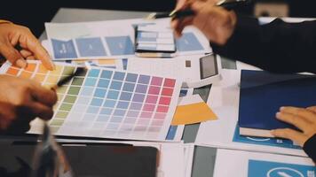 People working on a project with color samples video