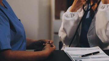 A doctor talking to a patient video