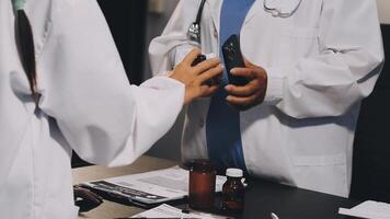 A doctor is checking the temperature of a patient video