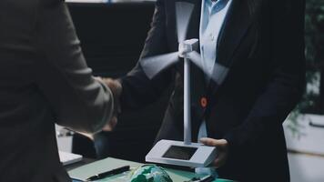 Businessman shaking hands with another person video