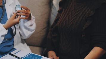A doctor is talking to a patient video