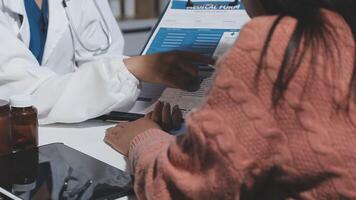 A doctor is talking to a patient video