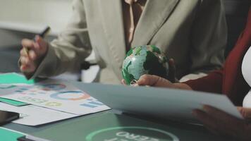 Two business people are working on a document video
