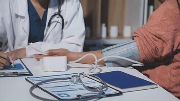 A doctor is talking to a patient video