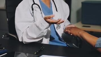 A doctor shaking hands with a patient video