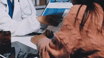 A doctor is talking to a patient video