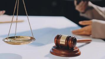 A judge gavel and a wooden table with a wooden table video