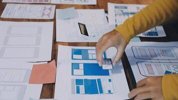 A person is working on a design project on a table video