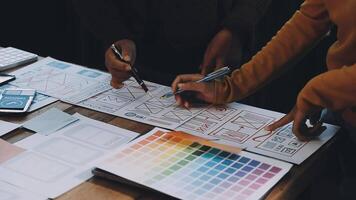 Two people working on a design project video