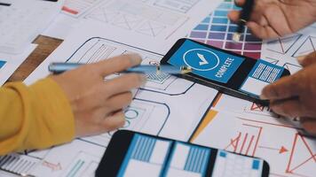 A person is using a smartphone to design a website video