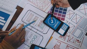 A person is working on a mobile app design video