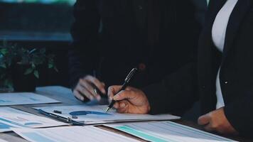 Two business people are working on a document video