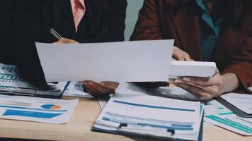 Two business people are working on paperwork video