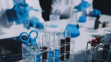 Laboratory equipment and laboratory workers in a laboratory video