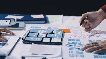 Business people working on a project at a table video