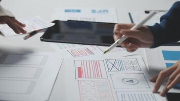 A person is working on a design project with a pen video