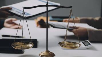 A scale with two golden scales on a table video
