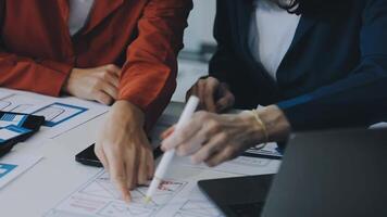 Two business people working on a project together video