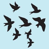 A flock of birds flying in the sky vector