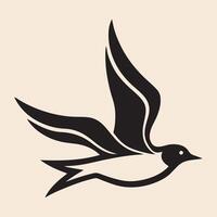 A black and white bird flying in the air vector