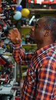 Man Buying Discounted Screwdriver in Hardware Store video
