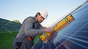 Worker Verifies Solar Panel Installation with Precision Tool video