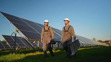 Workers Walk Through Solar Station After Installation video