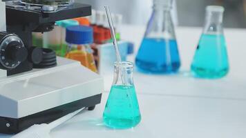 A laboratory with several different colored liquids video