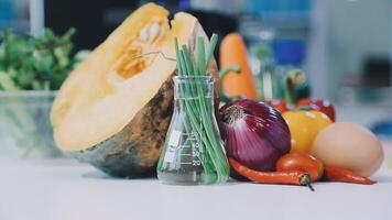 A variety of vegetables and fruits are sitting on a table video