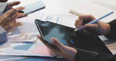 Business people using tablets and phones video