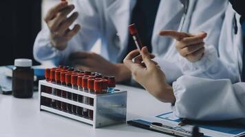 A group of doctors are working on a table video