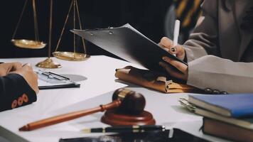 Lawyer and client in court video