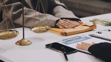 A lawyer and a client at a table video