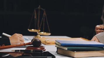 Lawyer and client in court video
