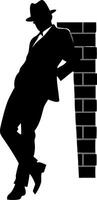 Mysterious Man Silhouette Leaning Against Brick Wall in Fedora vector