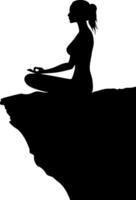 Silhouette of Woman Meditating on Cliff Edge at Sunset for Yoga and Tranquility Concepts vector