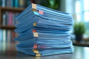 Stack of Organized Documents with Colorful Tabs in Office Setting photo