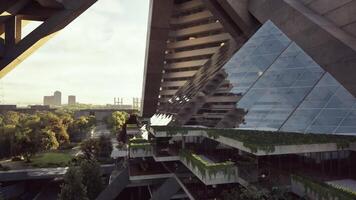 Modern architectural design featuring glass and greenery in an urban setting video