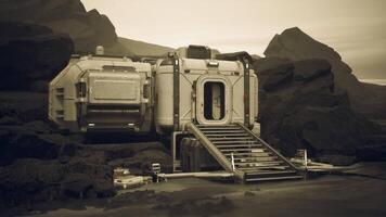 Colonist base on a distant planet features sturdy structure and rugged terrain video